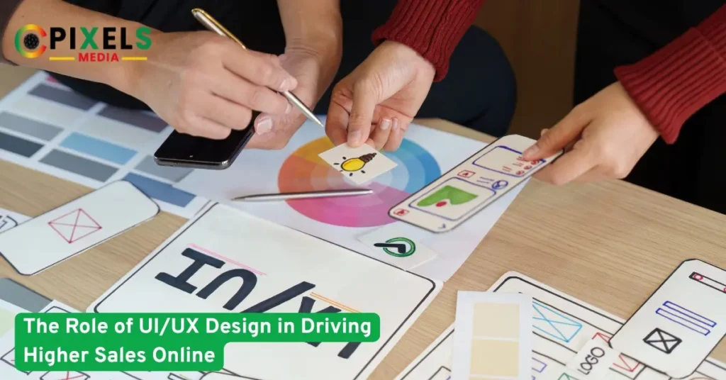 Designers planning UI/UX layout with color palette and app wireframes, highlighting the role of design in boosting online sales